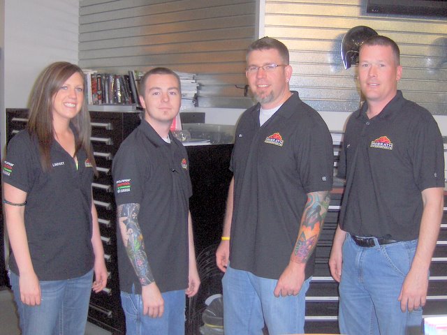 Photo of Lindsey, Forrest, Bill, and Jeff, Parts Professionals at McGrath Powersports, AMSOIL Retail Account in Cedar Rapids, Iowa.
